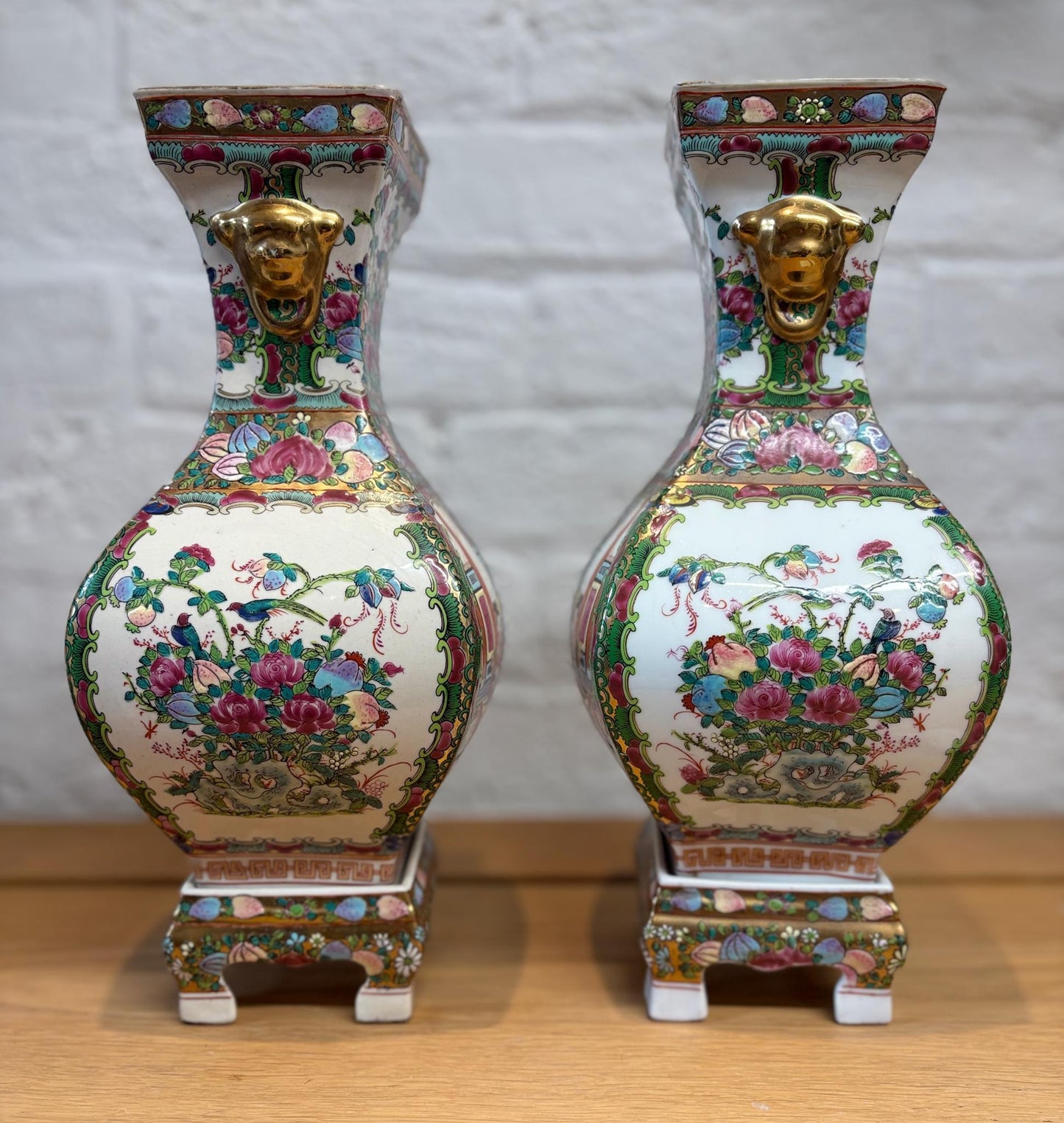 Pair of Late 20th‑Century Chinese Famille Rose Vases on Porcelain Stands